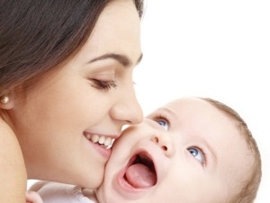 A mother holding her contented baby